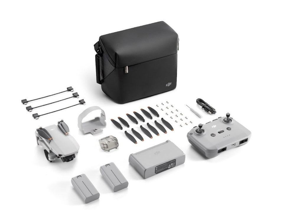 DJI Mini 2 SE Fly More Combo Camera Drone 31-min Under 249 g Extra Batteries DJI